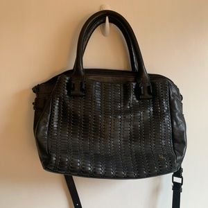 Leather handbag with cross body strap